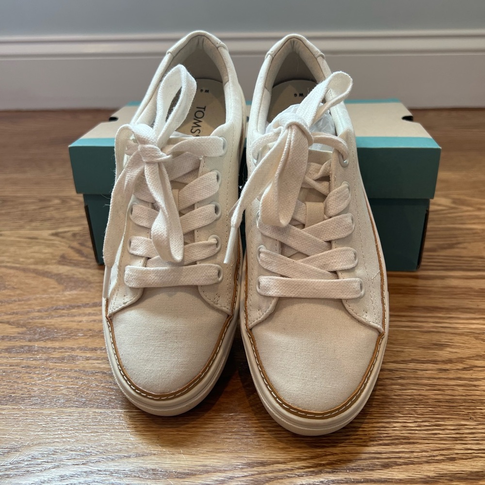Toms size 6 .cream canvas sneakers